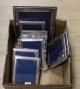 Nine assorted modern silver mounted photograph frames, including one pair, largest 32cm.