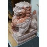 A Chinese carved marble dog of Fo, width 29cm, depth 45cm, height 78cm