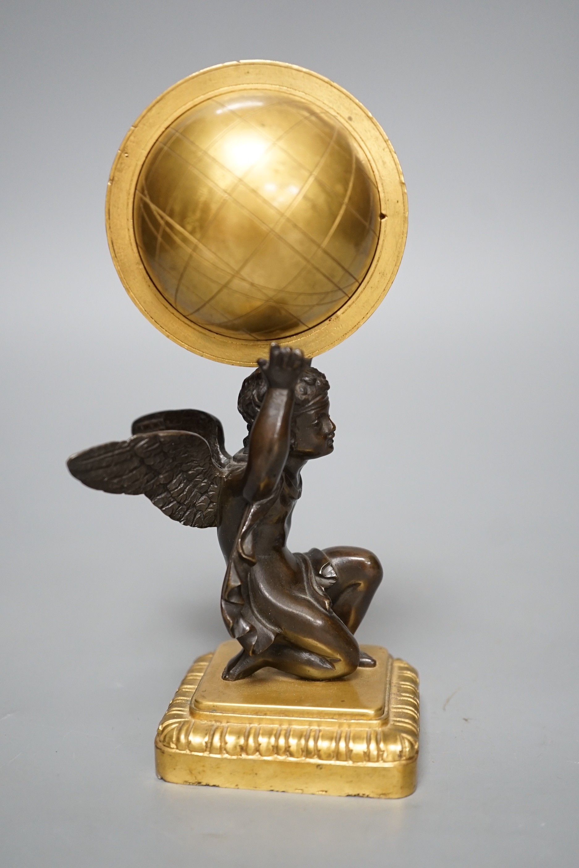 A late 19th century bronze and ormolu model of a cherub supporting a globe, 16cm - Image 4 of 4