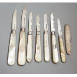 A collection of seven assorted mainly 20th century mother of pearl handled silver fruit knives and a