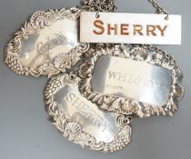Four assorted modern silver wine labels including enamelled Sherry.