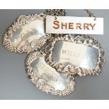 Four assorted modern silver wine labels including enamelled Sherry.