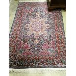 A North West Persian peach ground rug, 180 x 120cm