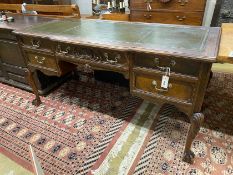 A George II style mahogany breakfront kneehole desk, width 152cm, depth 68cm, height 75cm