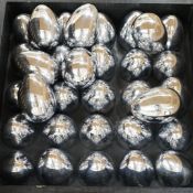 Wooden box of 32 Phillipi chiming silver plated eggs