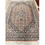 A North West Persian blue ground carpet, 260 x 170cm