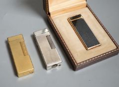 Three Dunhill lighters, one boxed