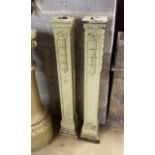 A pair of cast iron columns, height 90cm