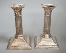 A pair of late Victorian silver Corinthian column dwarf candlesticks, W & G Sissons, London, 1897,