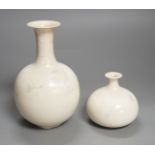 Two studio pottery white glazed bottle shaped vases, incised makers marks Ulich ? Tallest 17cm
