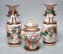 A pair of late 19th century Chinese crackle glaze vases and a similar vase and cover, tallest 29.