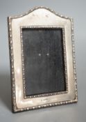 A George V silver mounted photograph frame, James Deakin & Sons, Sheffield, 1915, 19.6cm.