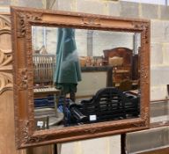 A Continental rectangular carved wood wall mirror, width 198cm, height 82cm and a small circular