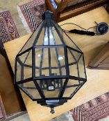 A contemporary octagonal painted metal hall lantern, height excluding chain 84cm