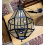 A contemporary octagonal painted metal hall lantern, height excluding chain 84cm