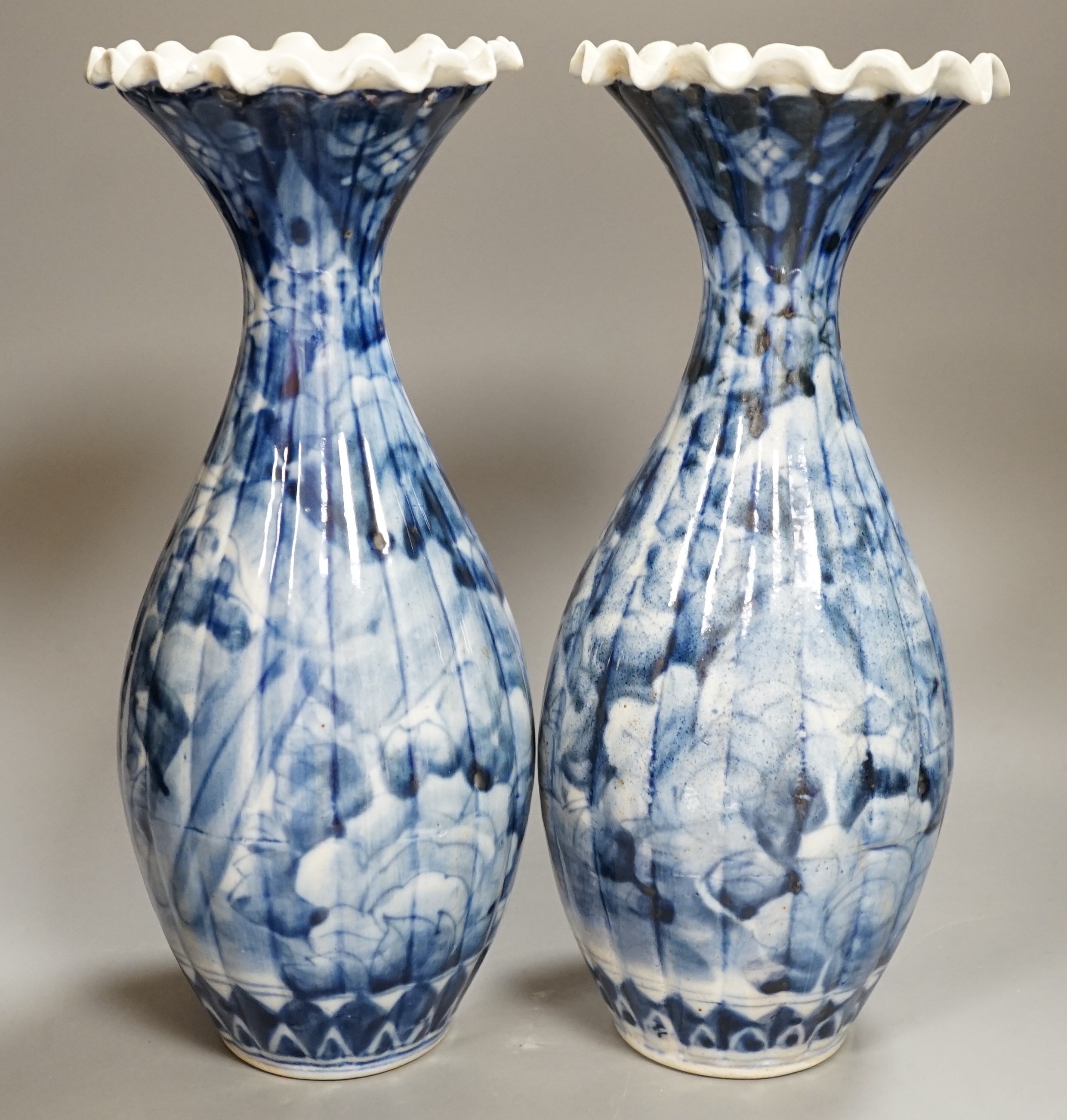 A pair of early 20th century Japanese fluted blue and white flared rim vases, 31.5cm - Image 4 of 6