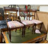 A set of seven Regency mahogany dining chairs, two with arms