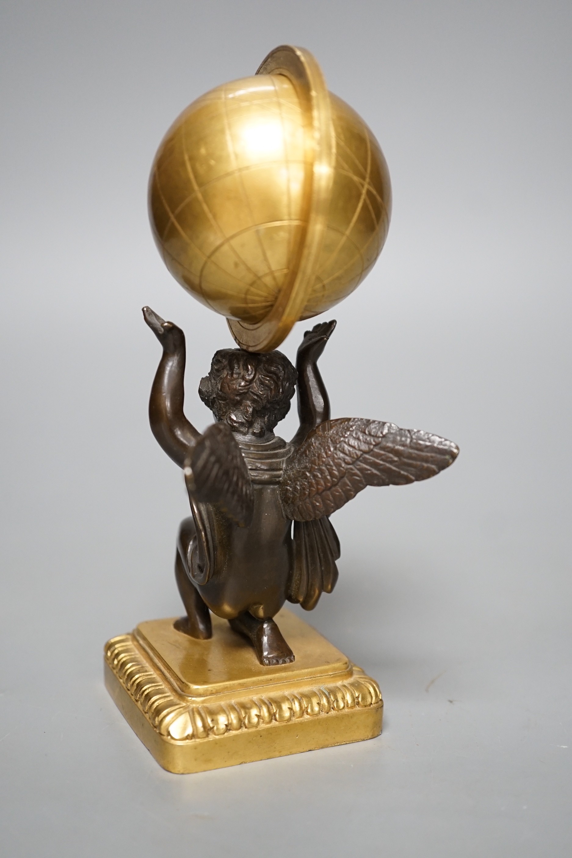 A late 19th century bronze and ormolu model of a cherub supporting a globe, 16cm - Image 3 of 4