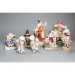 A selection of mainly Continental porcelain figures including Royal Crown Derby style mansion