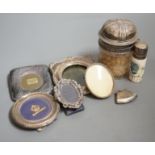 Four small silver mounted photograph frames, one brass frame, a silver lidded jar and one other