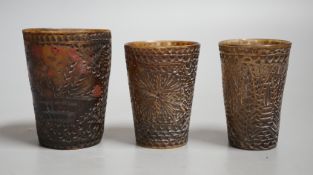 Three 19th century scrimshaw carved baleen cups. All inscribed and dated, Tallest 7cm