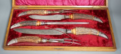 A Victorian E.R. Moore & Co. cased horn handled five piece carving set