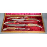 A Victorian E.R. Moore & Co. cased horn handled five piece carving set