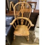 A bleached elm and beech Windsor armchair, width 69cm, depth 50cm, height 126cm