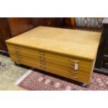 A mid century oak four draw plan chest top section, now on castors, width 130cm, depth 94cm,