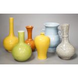 Six various Chinese porcelain or pottery vases, 22cm