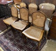 A set of five French carved beech dining chairs and a similar elbow chair