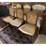 A set of five French carved beech dining chairs and a similar elbow chair