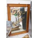 A Fry's Chocolate advertising mirror and frame, 39cms x 54cms including frame,