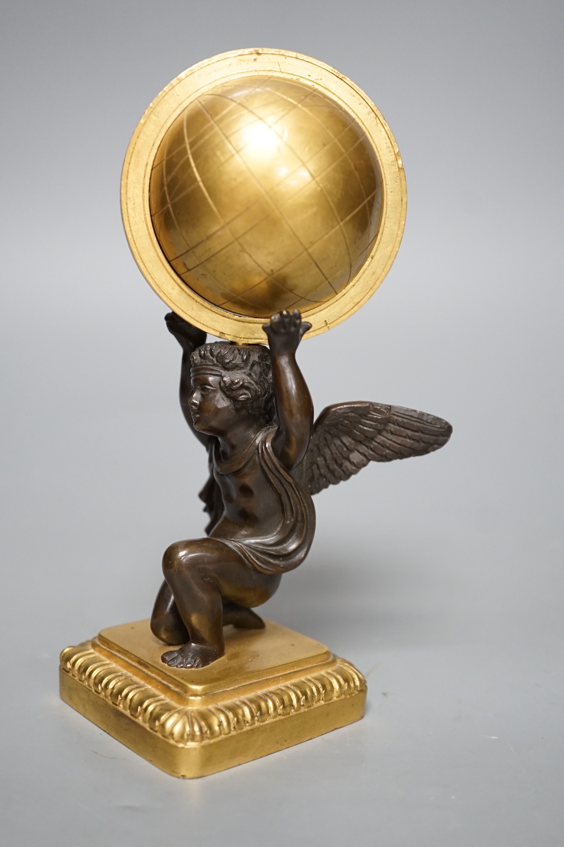 A late 19th century bronze and ormolu model of a cherub supporting a globe, 16cm - Image 2 of 4