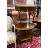 A pair of French style glass mounted mahogany oval occasional tables, width 54cm, height 62cm