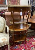A pair of French style glass mounted mahogany oval occasional tables, width 54cm, height 62cm