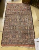 A flat weave polychrome rug, 180 x 106cm