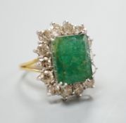 A yellow metal, emerald and diamond set rectangular cluster ring (shank cut), size M, gross weight