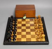 A late 19th / early 20th century weighted Staunton chess set, red crown stamps, kings 7.5cm, with