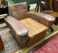 A mid 20th century French brown leather club armchair, width 88cm, depth 82cm, height 69cm