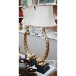 A pair of gilt resin feather table lamps. 72cm high