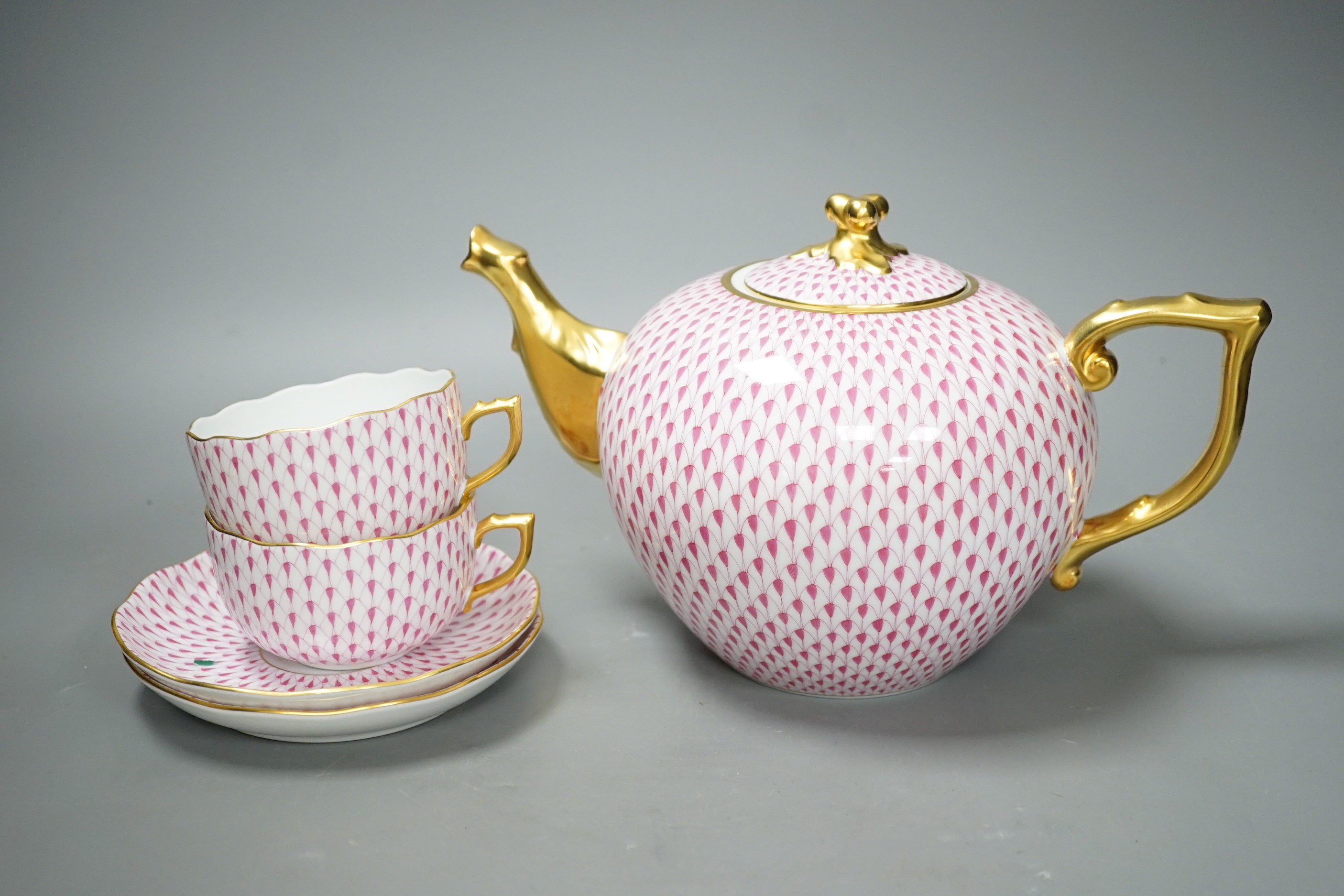 A Herend red scale pattern part tea set including two large teapots