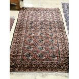 Two Bokhara red ground rugs, larger 180 x 125cm