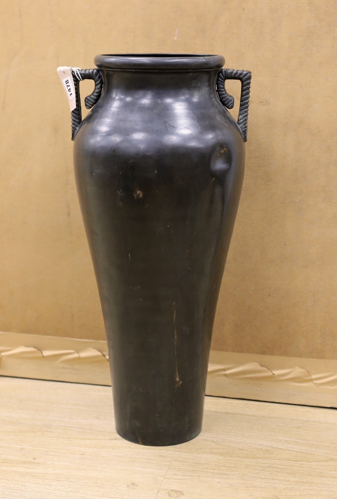 A large Japanese bronze two handled vase, 61cm high