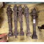 A set of five cast iron posts with flambe finials, height 56cm