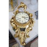 A Swedish giltwood cartouche shaped cartel wall clock, 58cms high,