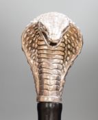 A Jeffery West umbrella with silver cobra handle,94cmslong