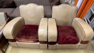 A pair of 1950's leatherette club chairs, width 85cm, depth 74cm, height 78cm
