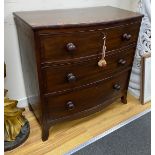 A late Regency coromandel banded mahogany bowfront chest of three drawers, height 85.5cm, width