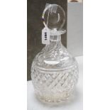 A Harrods cut glass decanter in original case, decanter and stopper, 33cms high